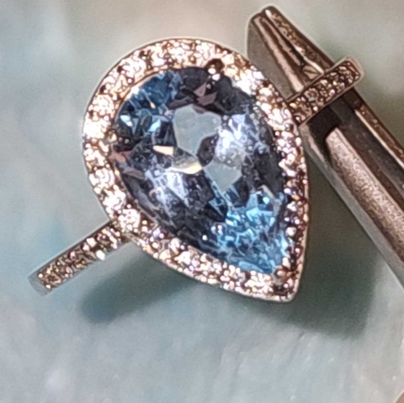 Blue topaz pear shape ring, with CZ, set in rodium over sterling silver, size 9 - Picture 1 of 8